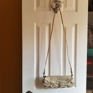HOBO brand small crossbody purse with scalloped detail. Bone color.